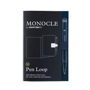 Monocle pen loop packaging with pen illustration on a white background