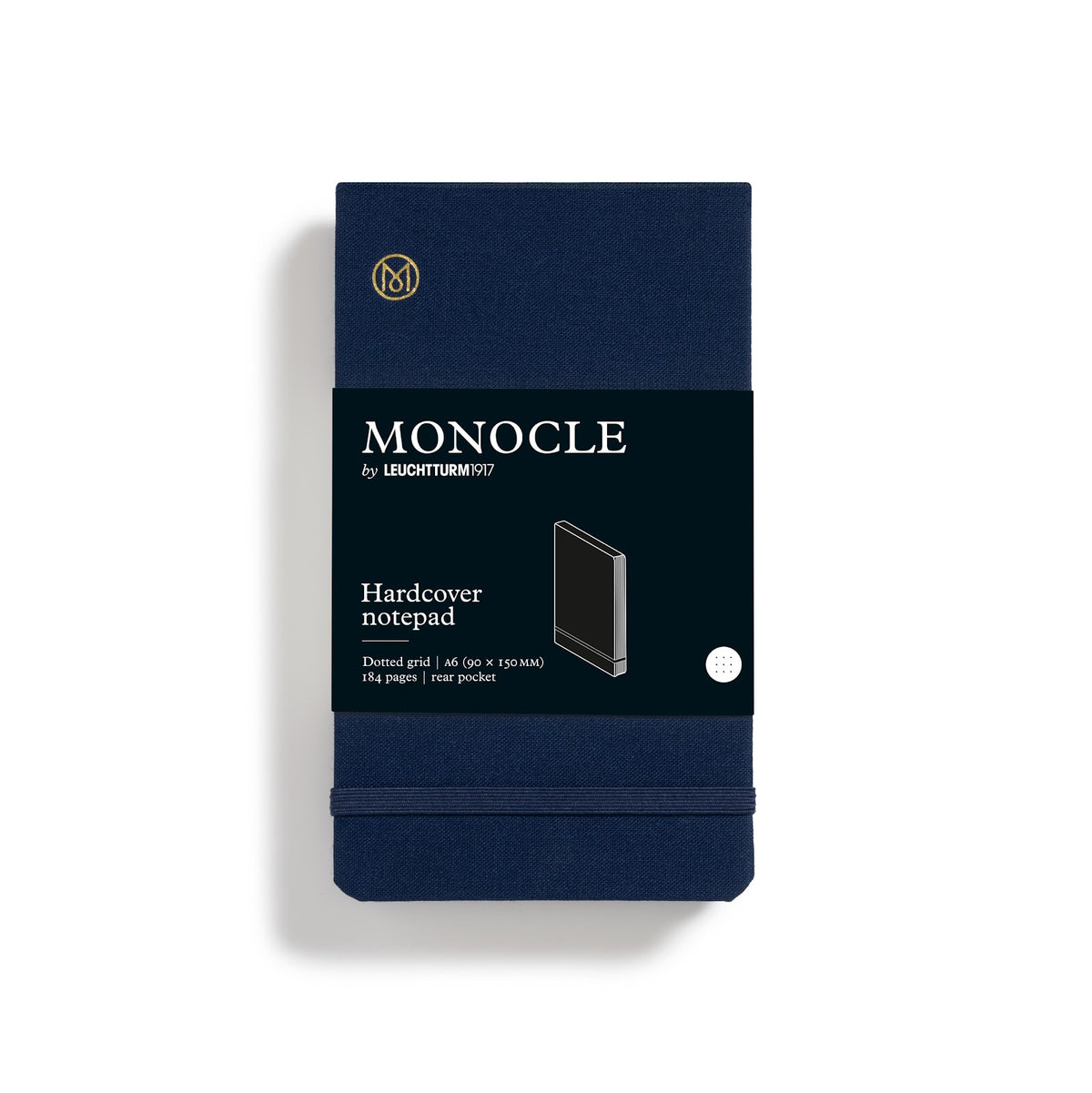 Navy blue notebook with Monocle branding on a white background