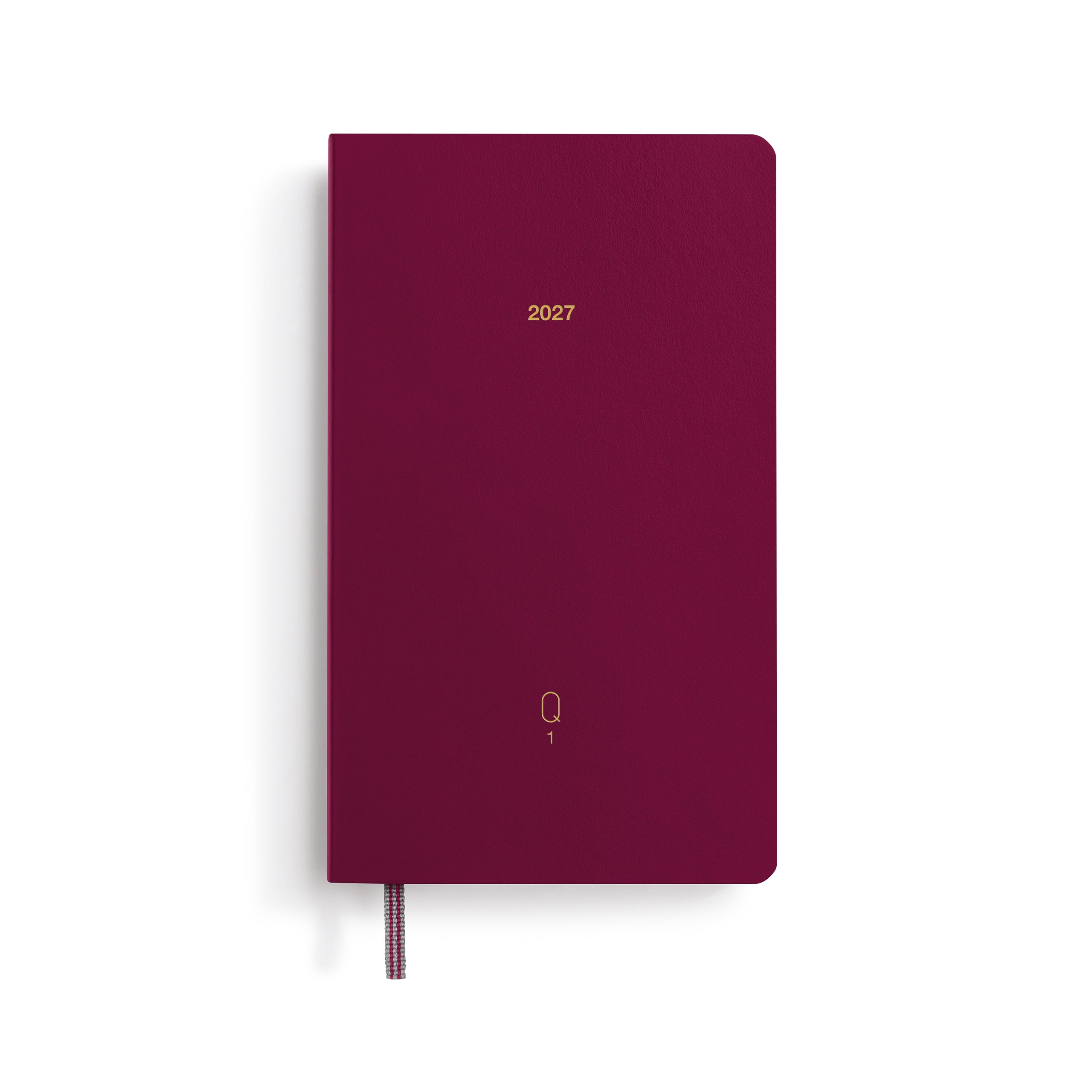 Maroon notebook with '2027' printed on it against a white background