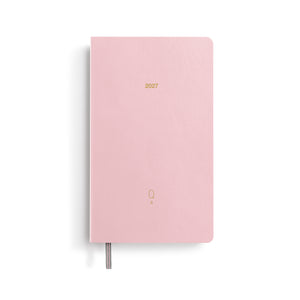Pink planner with '2027' on a white background