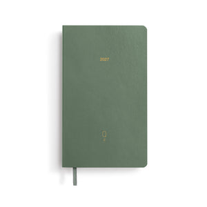 Green notebook with '2027' printed on the cover against a white background