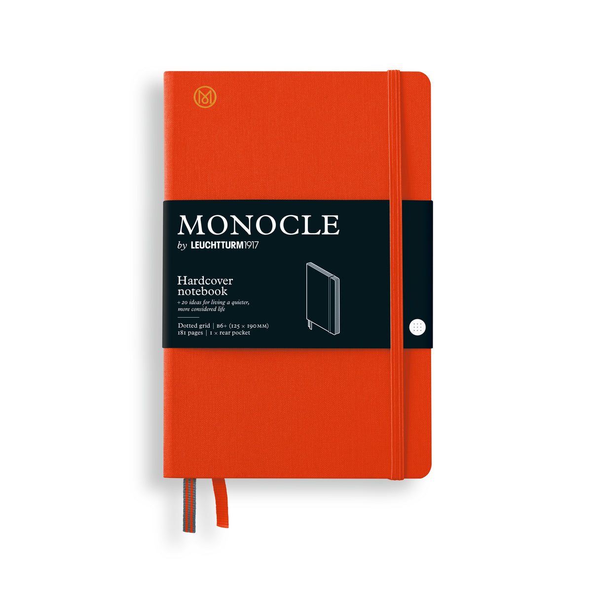 An orange Monocle hardcover notebook by Leuchtturm1917, featuring a black paper band around the middle with white text and a small white button on the right side, shown on a white background.