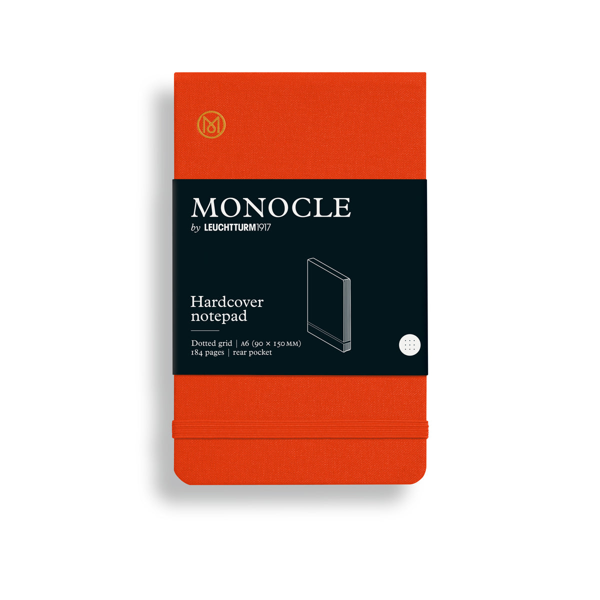 A Monocle Hardcover Notepad in a vibrant orange-red color, featuring a black paper band around the center with white text and a small illustration of the notepad.