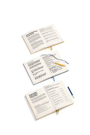 Three open books on a white background