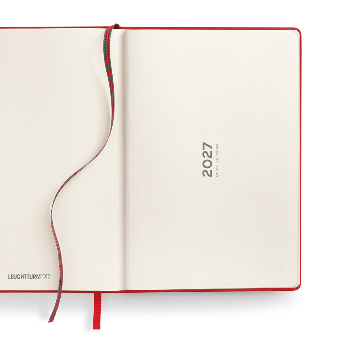 Leuchtturm1917 notebook with red binding on a white background